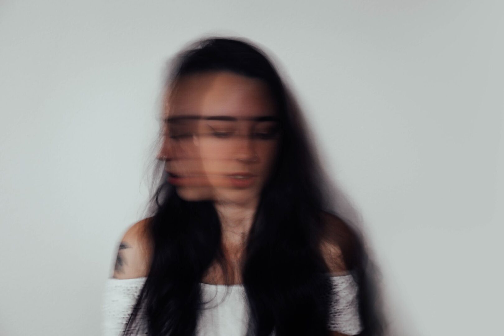 A young woman experiencing Bipolar disorder at home